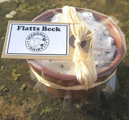 Flatts Beck is a creamy pasteurised cow milk cheese flavoured with garlic, chive & parsley.
