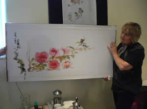 Irene with one of her demos that she auctions off at the end of the day for charity. .. Flowers in Far Eastern Brush Painting with Irene Sanderson at Greystoke